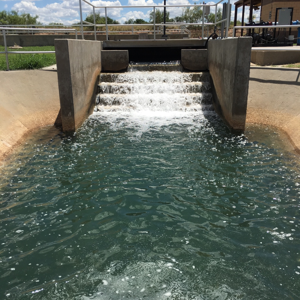 A picture of water cascading from the final effluent at the cascade